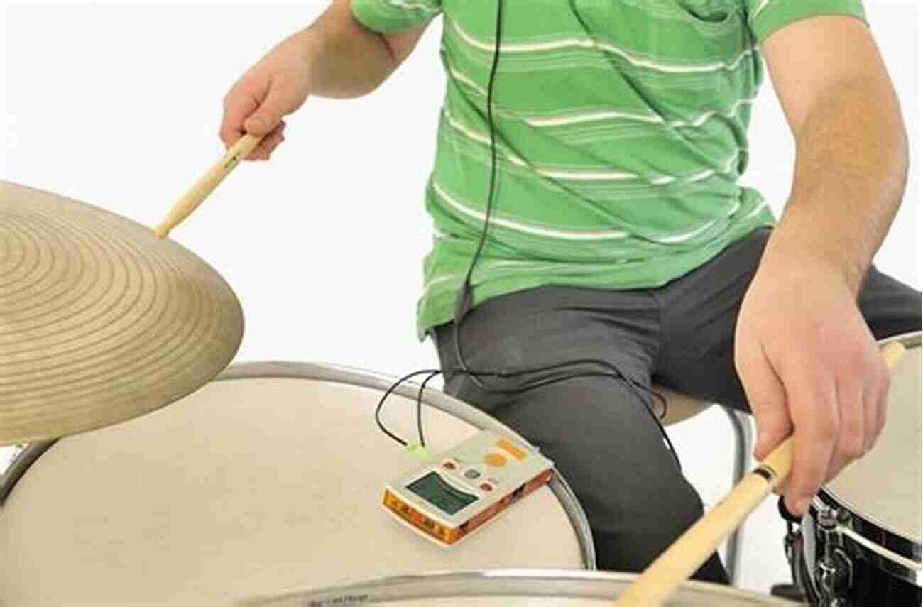 A Drummer Practicing With Metronome Survival Guide For The Modern Drummer: A Crash Course In All Musical Styles For Drumset