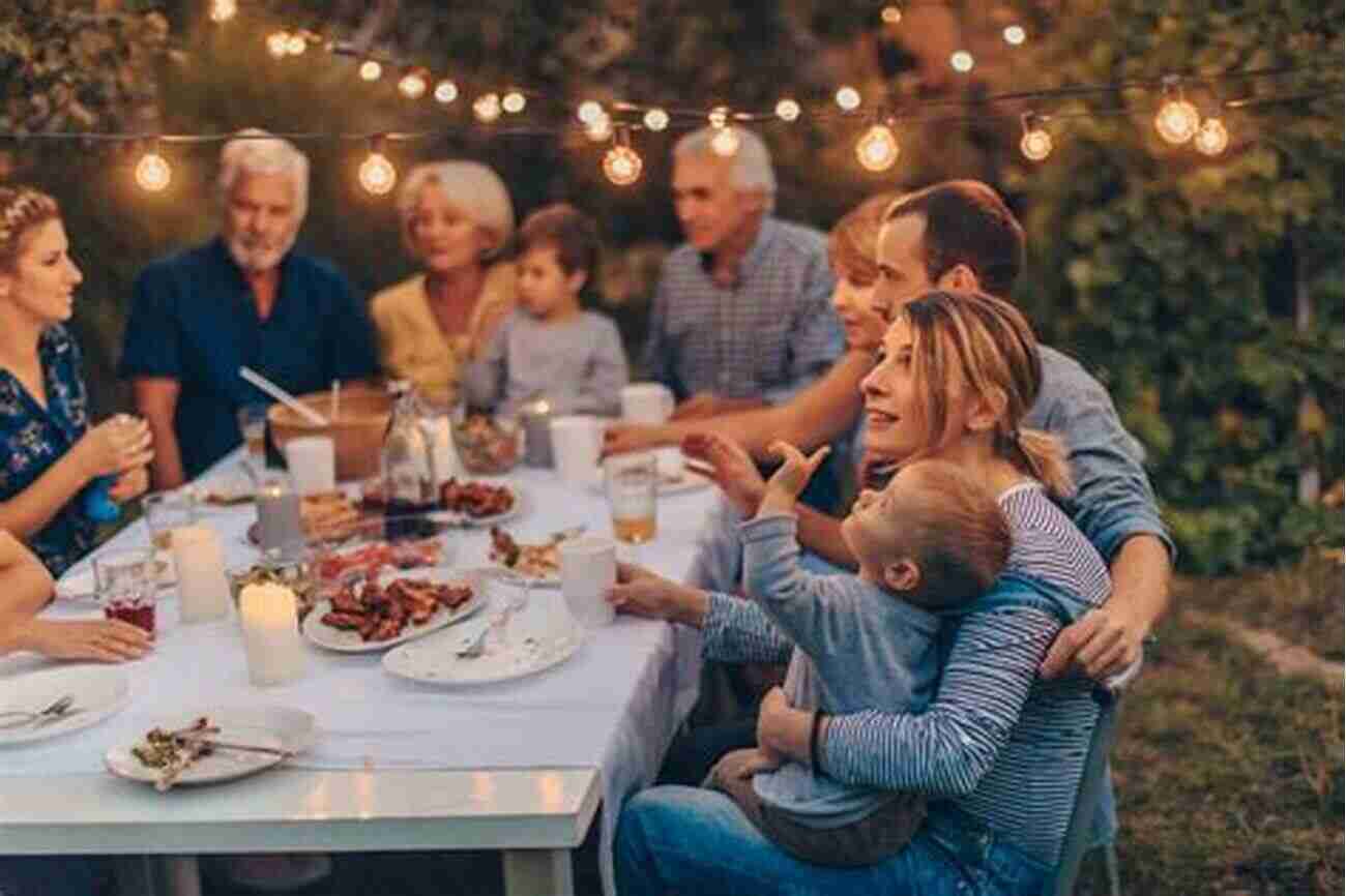 A Happy Family Gathering Around A Dinner Table During A Celebration If You Met My Family You D Understand: A Family Systems Primer