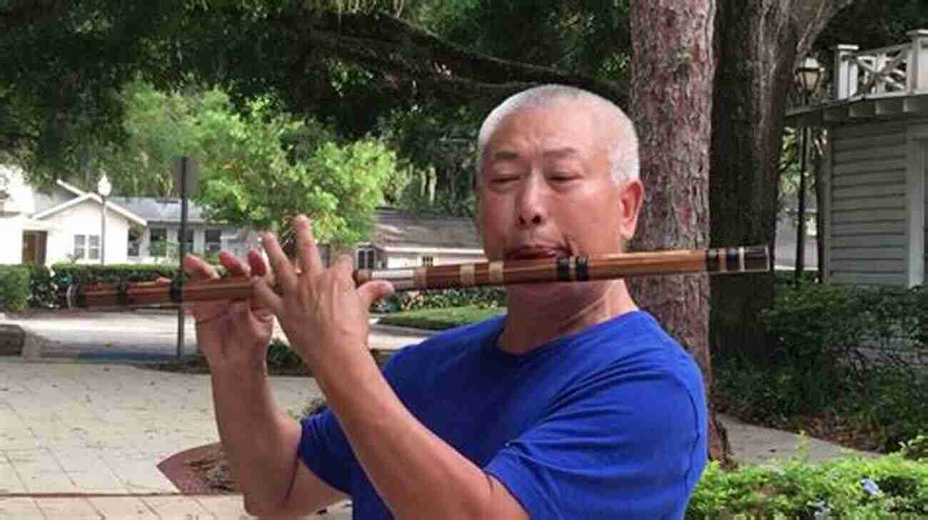 A Person Playing The Dizi The Chinese Bamboo Flute With Mastery How To Play Dizi The Chinese Bamboo Flute: The Advanced Skills