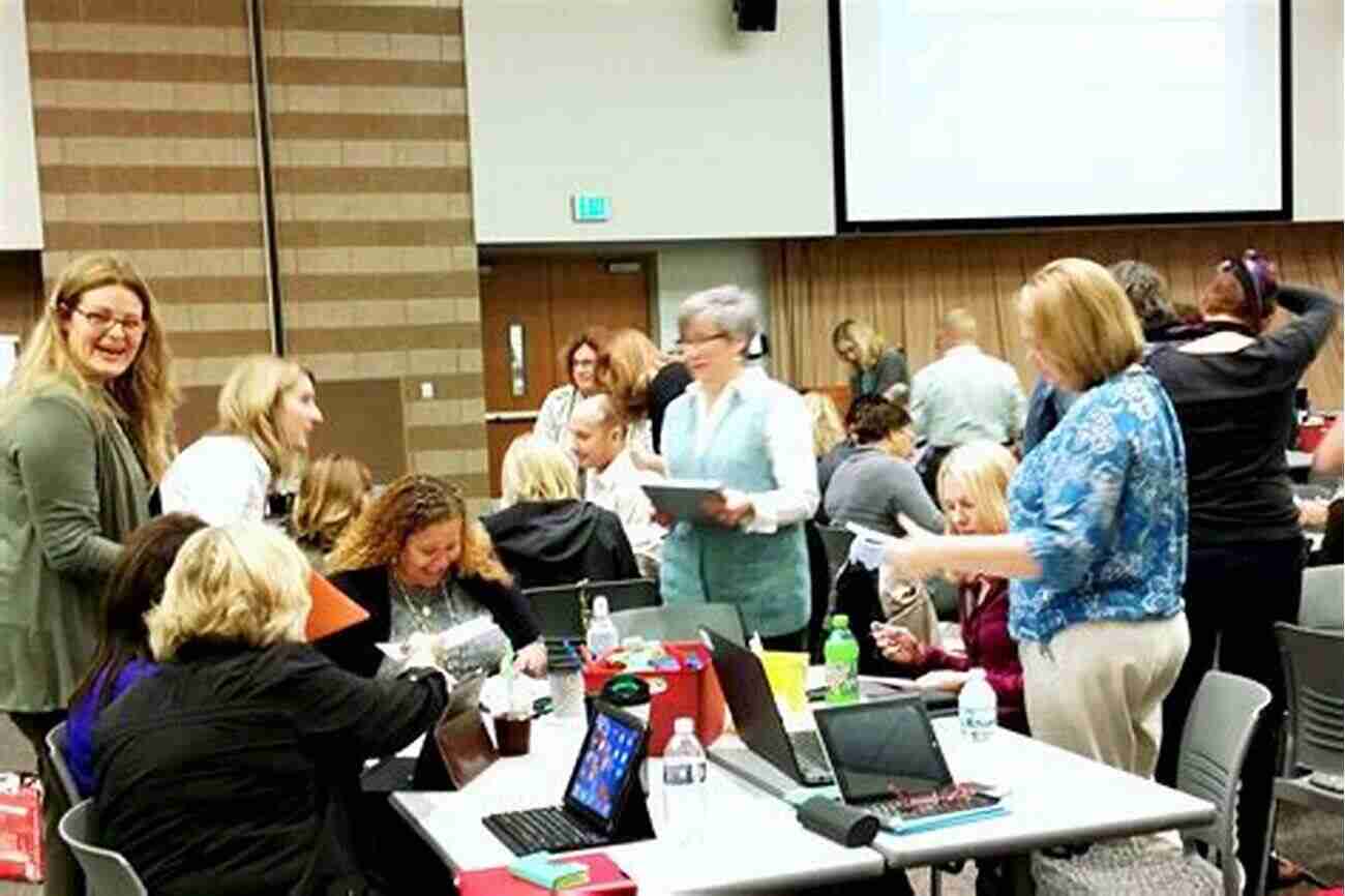 Instructional Coach Collaborating With A Teacher During A Planning Session The Impact Cycle: What Instructional Coaches Should Do To Foster Powerful Improvements In Teaching